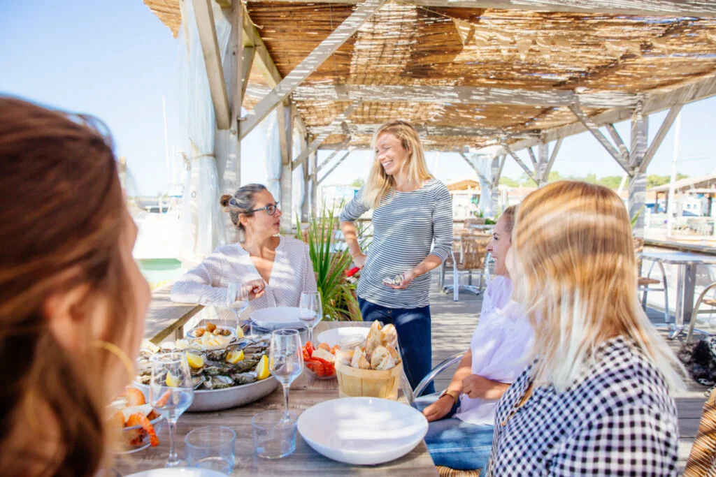 Condividere un piatto di pesce ad Andernos